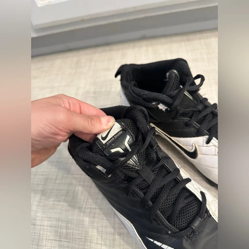 Nike Speed Shark 3/4 Football cleats in black and white.